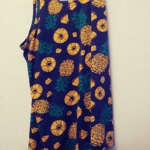 yellow pinapples,  and black background +green leaves